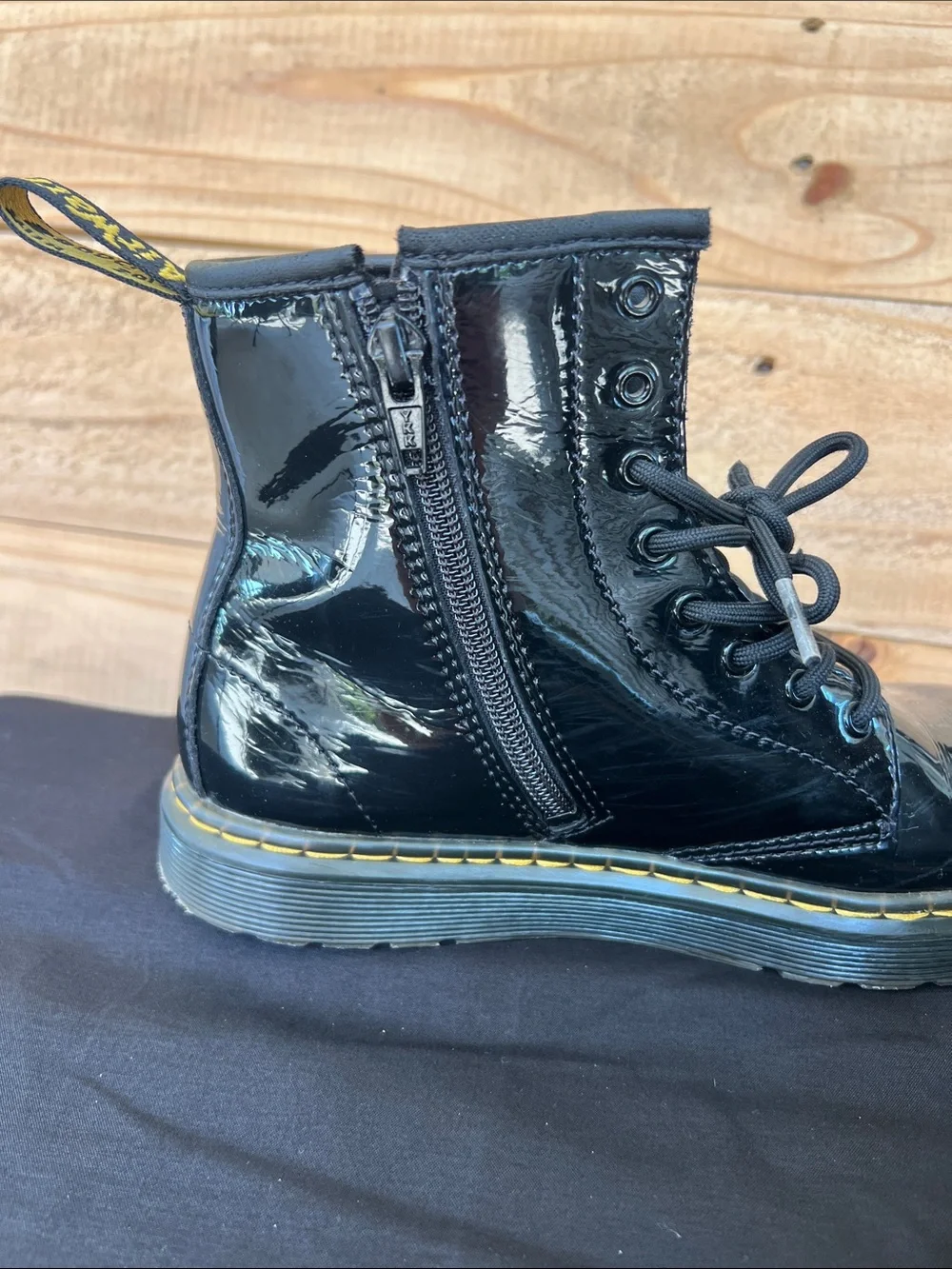 Dr. Martens Kids Black Patent Lace-Up Zip Combat Boots with Yellow Stitching